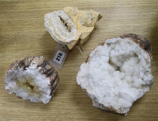 Three white quartz geodes, largest 18cm